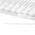 Interdentalbürsten entfernen Plaque und Speisereste zwischen den Zähnen.